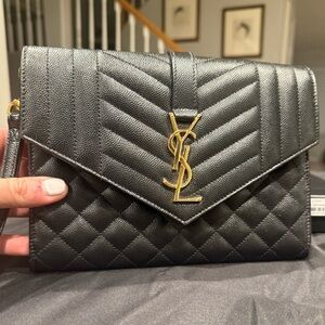 Yves Saint Laurent Black Quilted Bag with Gold Logo